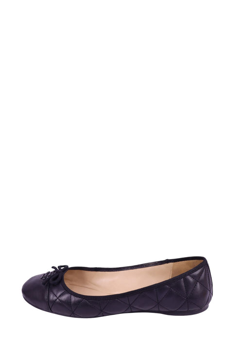 Coach black quilted leather ballet flats with cap toe and bow detail