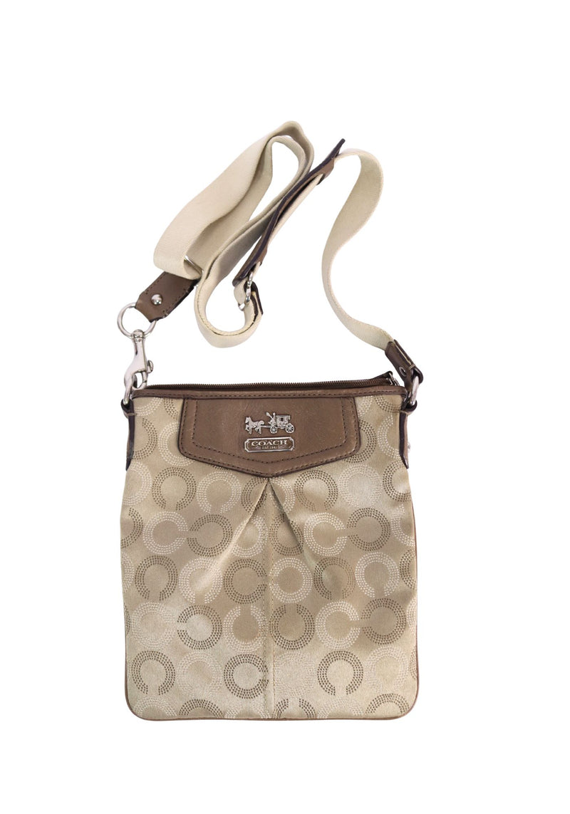 Coach beige signature jacquard crossbody bag with brown leather trim and adjustable canvas shoulder strap