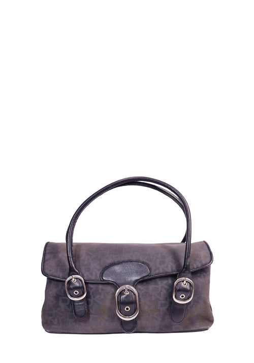 DKNY monogram canvas shoulder bag with black leather trim, silver-tone buckle accents, and double shoulder handles.