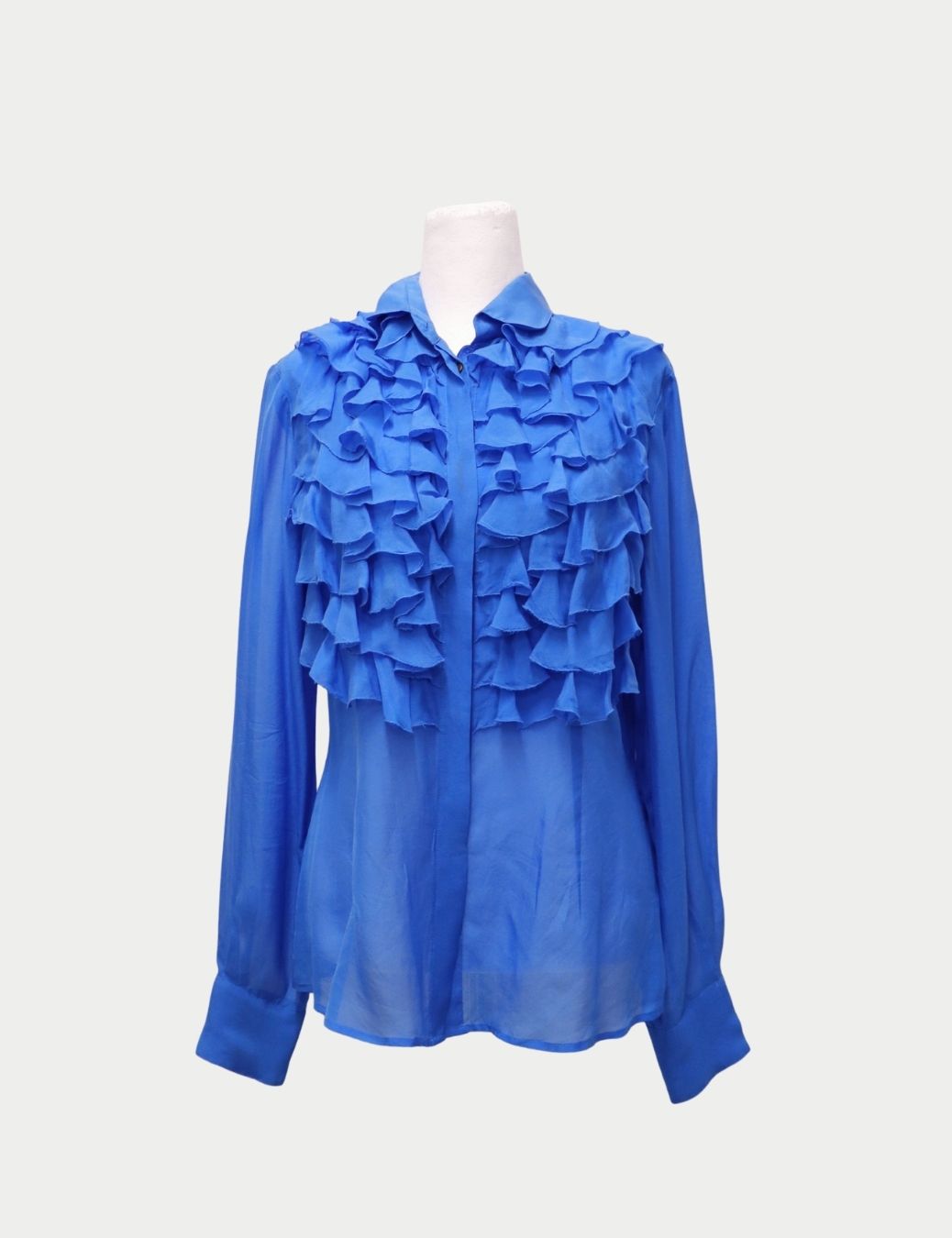 Dolce & Gabbana Blue Ruffle Front Blouse – Long Sleeve Lightweight Shirt
This striking Dolce & Gabbana blue ruffle blouse brings feminine drama and Italian sophistication to any wardrobe. Crafted from a lightweight, flowy fabric, the blouse featur Dolce & Gabbana Blue Ruffle Front Blouse – Long Sleeve Lightweight Shirt
This striking Dolce & Gabbana blue ruffle blouse brings feminine drama and Italian sophistication to any wardrobe. Crafted from a lightweight, flowy fabric, the blouse featur