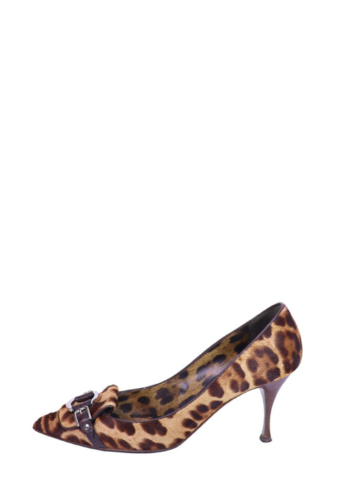 Dolce & Gabbana leopard print pony hair pointed heels with brown leather buckle detailing and slim heels.