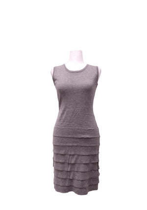 Calvin Klein grey sleeveless fine-knit dress featuring a round neckline, fitted bodice, and multi-layered horizontal tiered skirt