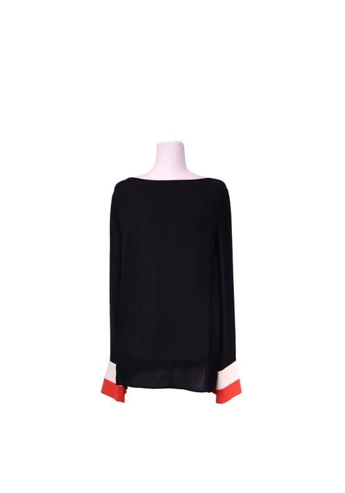 Emilio Pucci black silk long sleeve blouse featuring a boat neckline and bold red and white color-block cuffs.