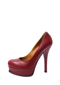 Fendi burgundy leather platform pumps featuring rounded closed toes, thick front platforms, towering stiletto heels and tan interiors