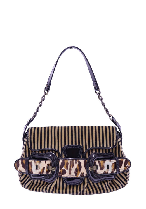 Authentic Fendi Baguette shoulder bag in zebra-striped pony hair with animal-print buckle accents, black patent leather trim, and FF hardware.