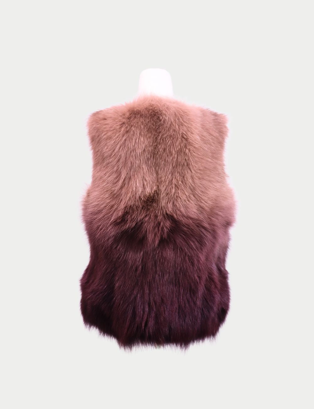 Elevate your wardrobe with the Vero Moda Light Pink & Purple Ombre Fur Vest, a striking layering piece that combines warmth with modern sophistication. Featuring a unique gradient effect that fades from soft blush pink at the shoulders to rich purple Elevate your wardrobe with the Vero Moda Light Pink & Purple Ombre Fur Vest, a striking layering piece that combines warmth with modern sophistication. Featuring a unique gradient effect that fades from soft blush pink at the shoulders to rich purple