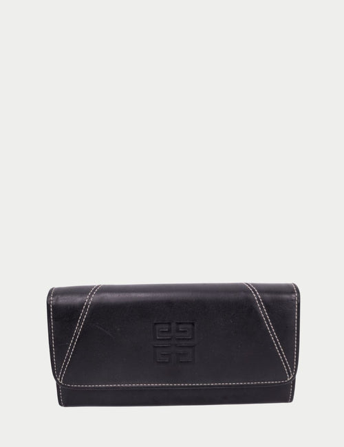 Givenchy black leather long wallet with embossed logo, flap closure, and contrast stitching