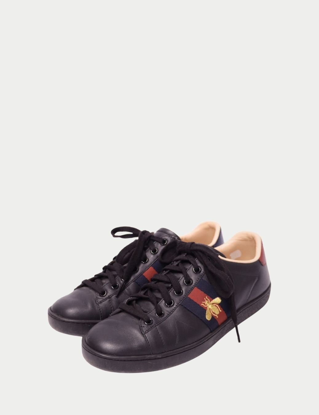 Gucci Ace Black Leather Sneakers – Bee Embroidered Web Stripes
Step into iconic style with these Gucci Ace black leather sneakers, featuring the brand’s signature red and navy Web stripe and the instantly recognizable gold embroidered bee. Crafted from sm Gucci Ace Black Leather Sneakers – Bee Embroidered Web Stripes
Step into iconic style with these Gucci Ace black leather sneakers, featuring the brand’s signature red and navy Web stripe and the instantly recognizable gold embroidered bee. Crafted from sm