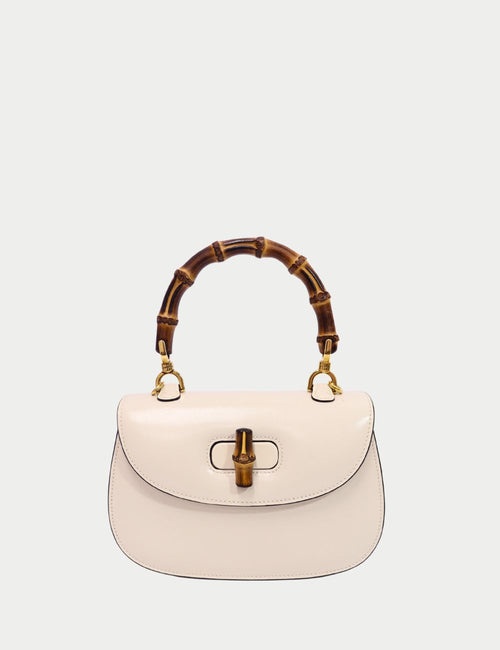 Gucci white leather handbag with bamboo top handle and bamboo turn-lock closure