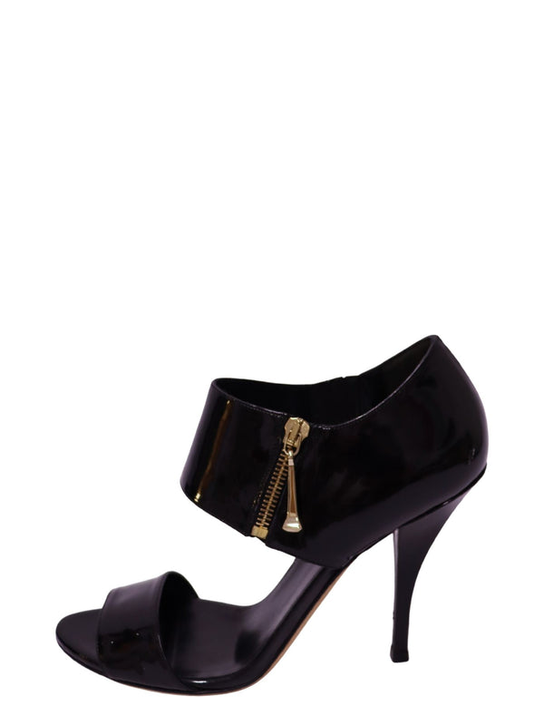 Gucci black patent leather open-toe stiletto heels with wide ankle cuff and gold-tone zipper