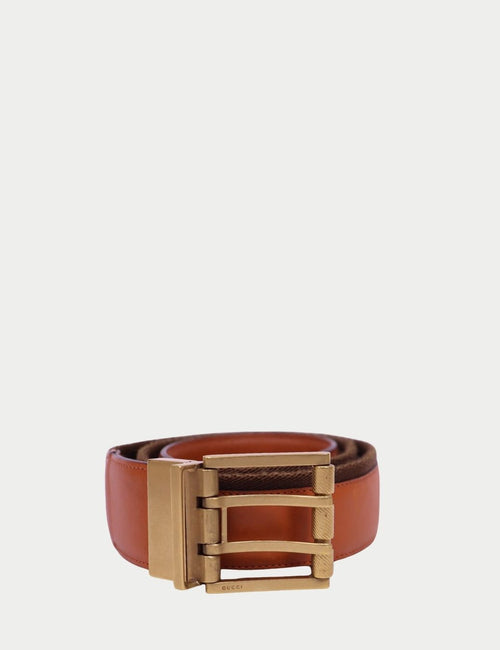 Gucci brown leather belt with structured design and matte gold-tone buckle
