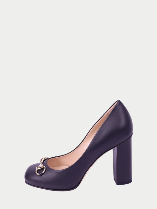Gucci black leather pumps with signature horsebit detail and block heel