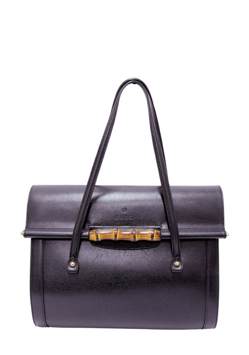 Authentic Gucci Bamboo black leather top handle shoulder bag with iconic bamboo turn-lock closure and gold-tone hardware.