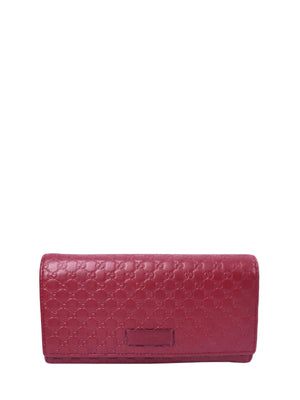 Gucci red microguccissima embossed leather wallet with GG monogram pattern