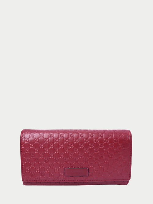Gucci red microguccissima embossed leather wallet with GG monogram pattern