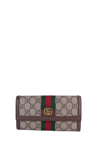 Gucci Ophidia GG continental wallet in beige GG Supreme canvas with brown leather trim, green and red Web stripe, and gold Double G logo.