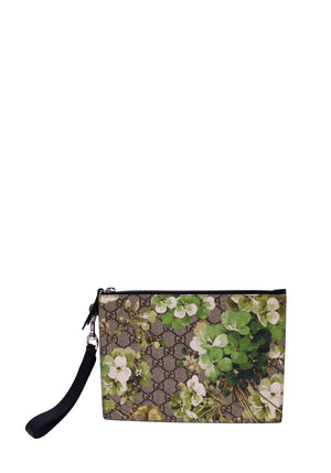 Gucci GG Supreme beige and ebony monogram canvas wristlet pouch featuring a vibrant green botanical floral print, white blossoms, black trim, top zipper closure, silver-tone hardware and black wrist strap