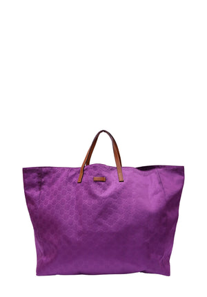 Gucci large purple GG monogram tote bag featuring tonal interlocking GG patterned fabric, double brown leather handles, rectangular Gucci logo plaque and oversized shopper silhouette