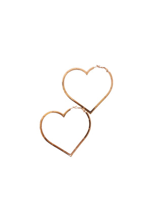 Pair of Chanel oversized gold-tone heart-shaped hoop earrings featuring polished open-heart metal silhouettes, subtle engraved detailing and hinged post closures