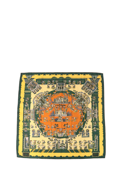 Vintage Hermès 1994 Astres et Soleils silk scarf with multicolor celestial and architectural print in green, orange, and yellow tones.
