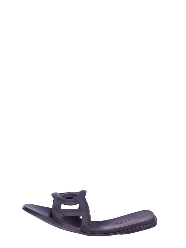 Hermès Aloha Chaîne d'Ancre black rubber slide sandals featuring the signature anchor chain cutout design and flat slip-on silhouette