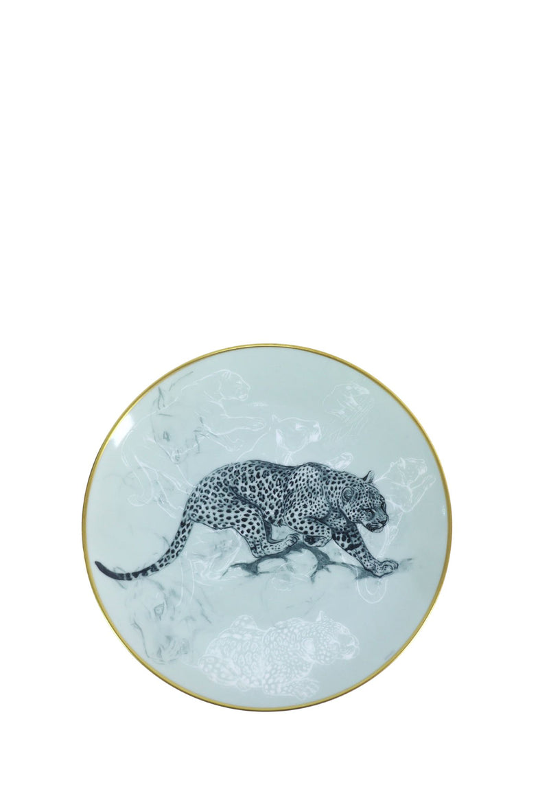 Hermès Carnets d'Équateur porcelain dessert plate featuring a detailed black-and-white panther illustration at the center, accented by subtle feline sketches in the background and a fine gold rim. Elegant wildlife-inspired design from the Carnets d'Équateur collection
