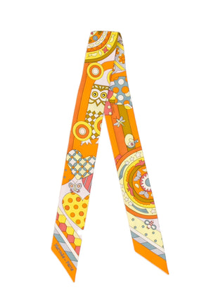Hermès Les Murmures de la Forêt silk Twilly scarf featuring vibrant orange tones and whimsical forest-inspired motifs