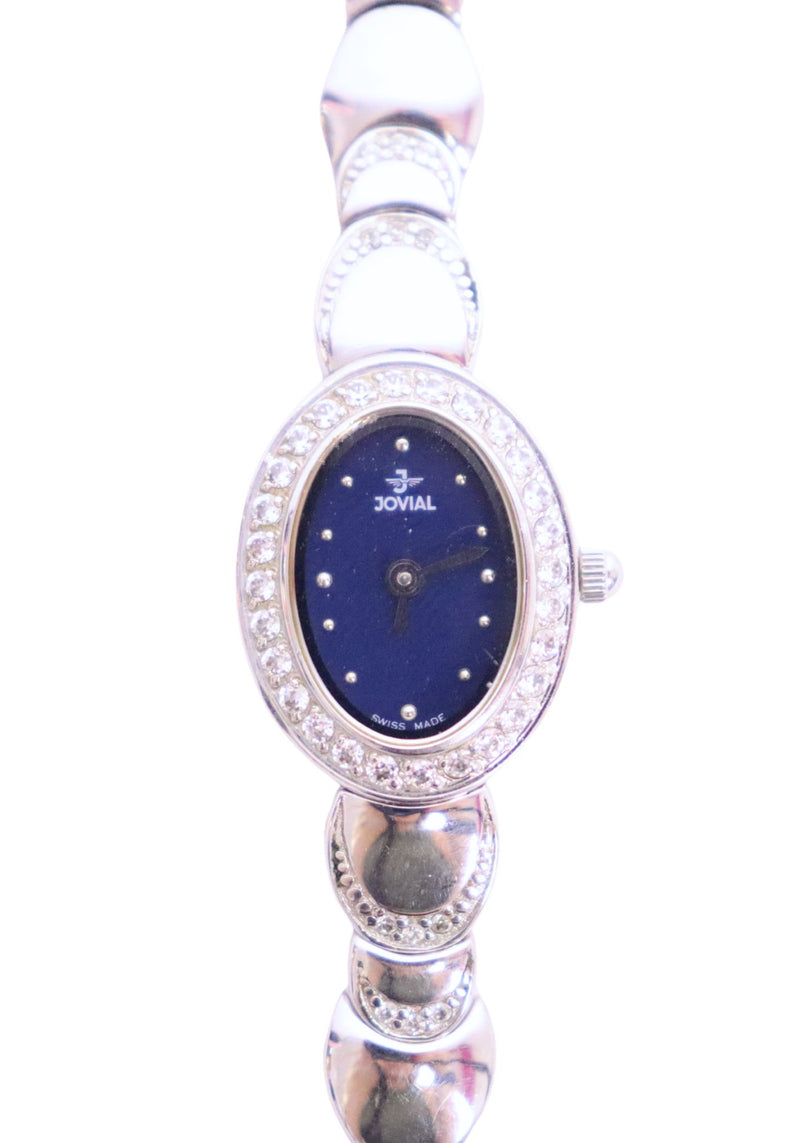 Jovial Swiss-made silver-tone watch with navy blue dial, crystal-set bezel, and oval case design