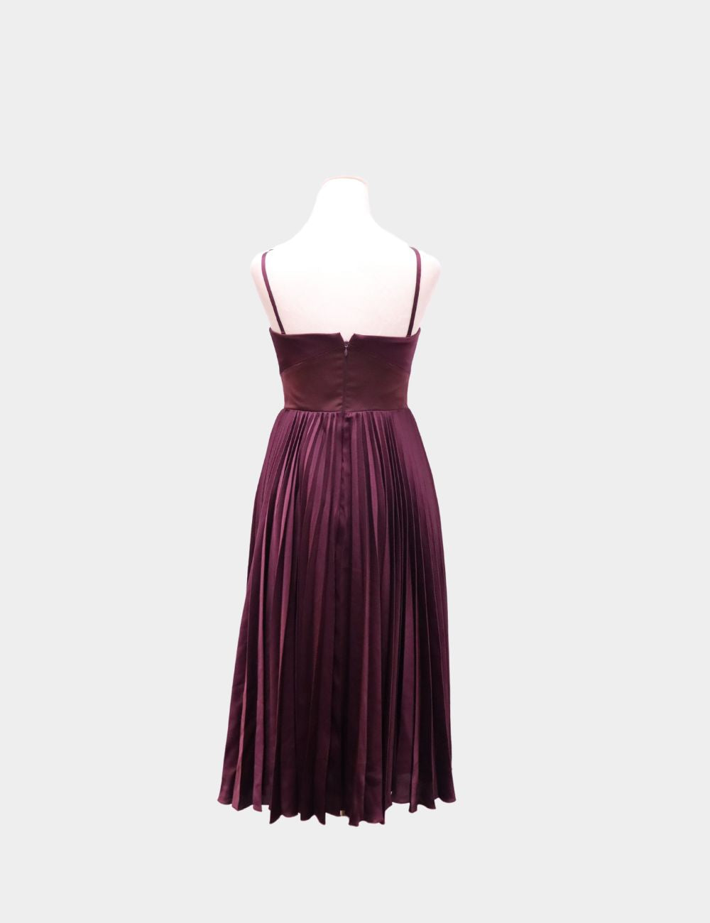 Elegance meets drama in this Karen Millen burgundy pleated midi dress, crafted in lustrous satin with a sculpted bodice and flowing pleated skirt. The flattering silhouette features delicate spaghetti straps and a fitted waist that effortlessly highlights Elegance meets drama in this Karen Millen burgundy pleated midi dress, crafted in lustrous satin with a sculpted bodice and flowing pleated skirt. The flattering silhouette features delicate spaghetti straps and a fitted waist that effortlessly highlights