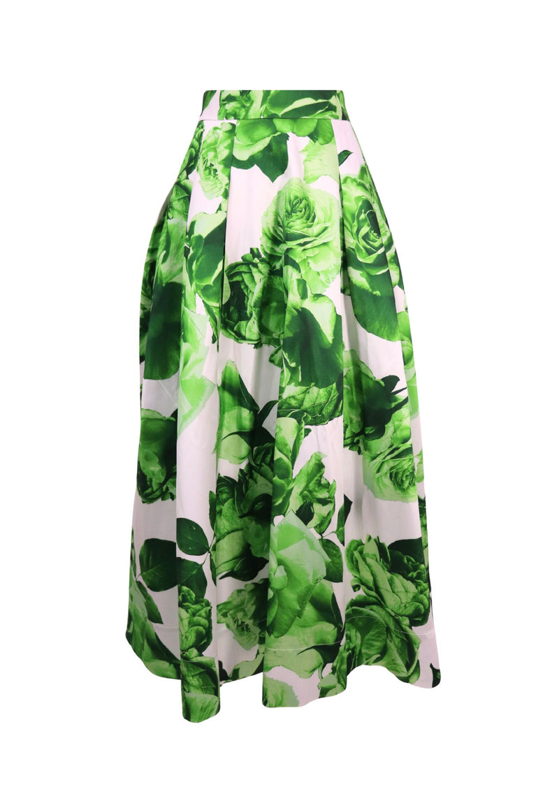 Karen Millen maxi skirt featuring a vibrant green rose floral print on a white background. Designed with a high-waisted silhouette, structured pleats, and a voluminous A-line shape that falls to ankle length