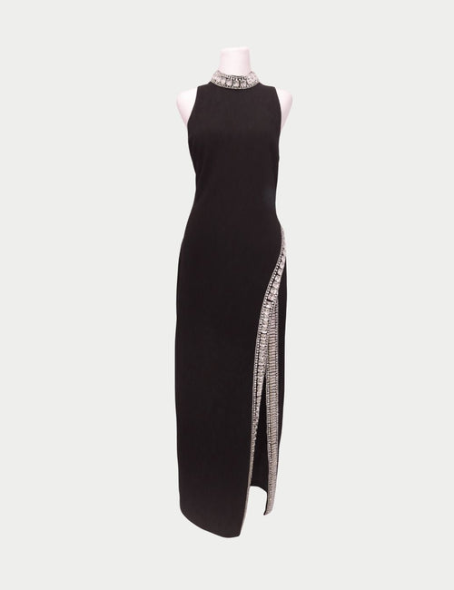 Black Karen Millen evening gown with jeweled neckline and thigh-high slit