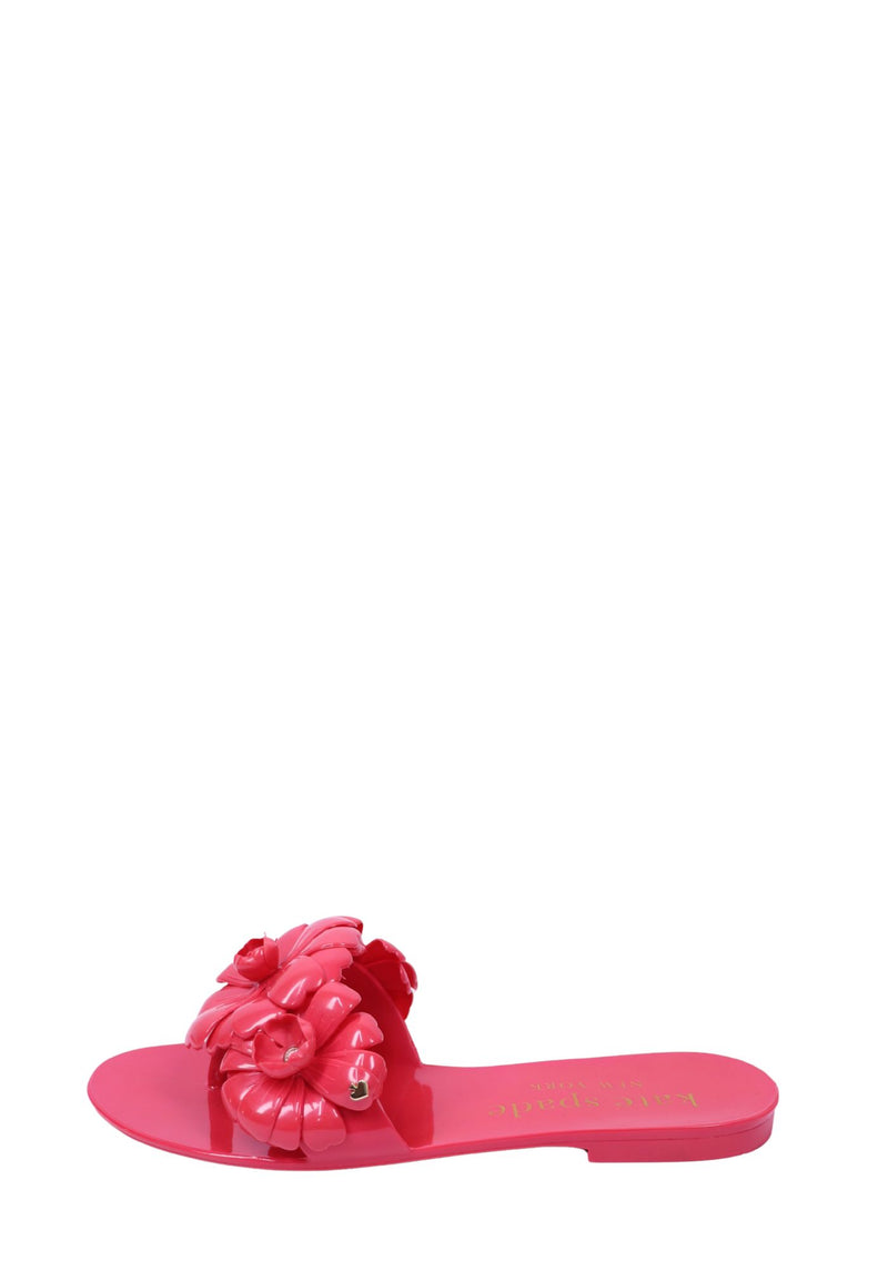 Kate Spade pink slide sandals with oversized 3D floral detail and glossy finish