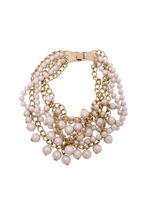 Authentic Kate Spade gold-tone multi-strand necklace featuring layered blush faux pearls and chain detailing.