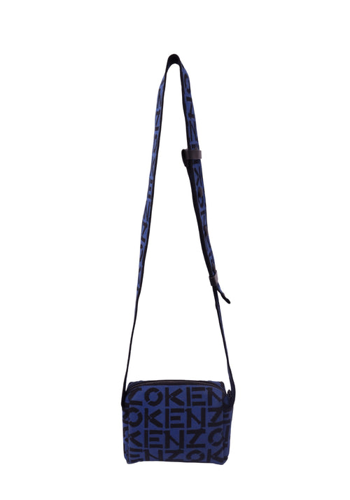 Kenzo blue and black jacquard crossbody bag featuring an oversized all-over KENZO logo pattern, rectangular silhouette, top zipper and adjustable logo shoulder strap.