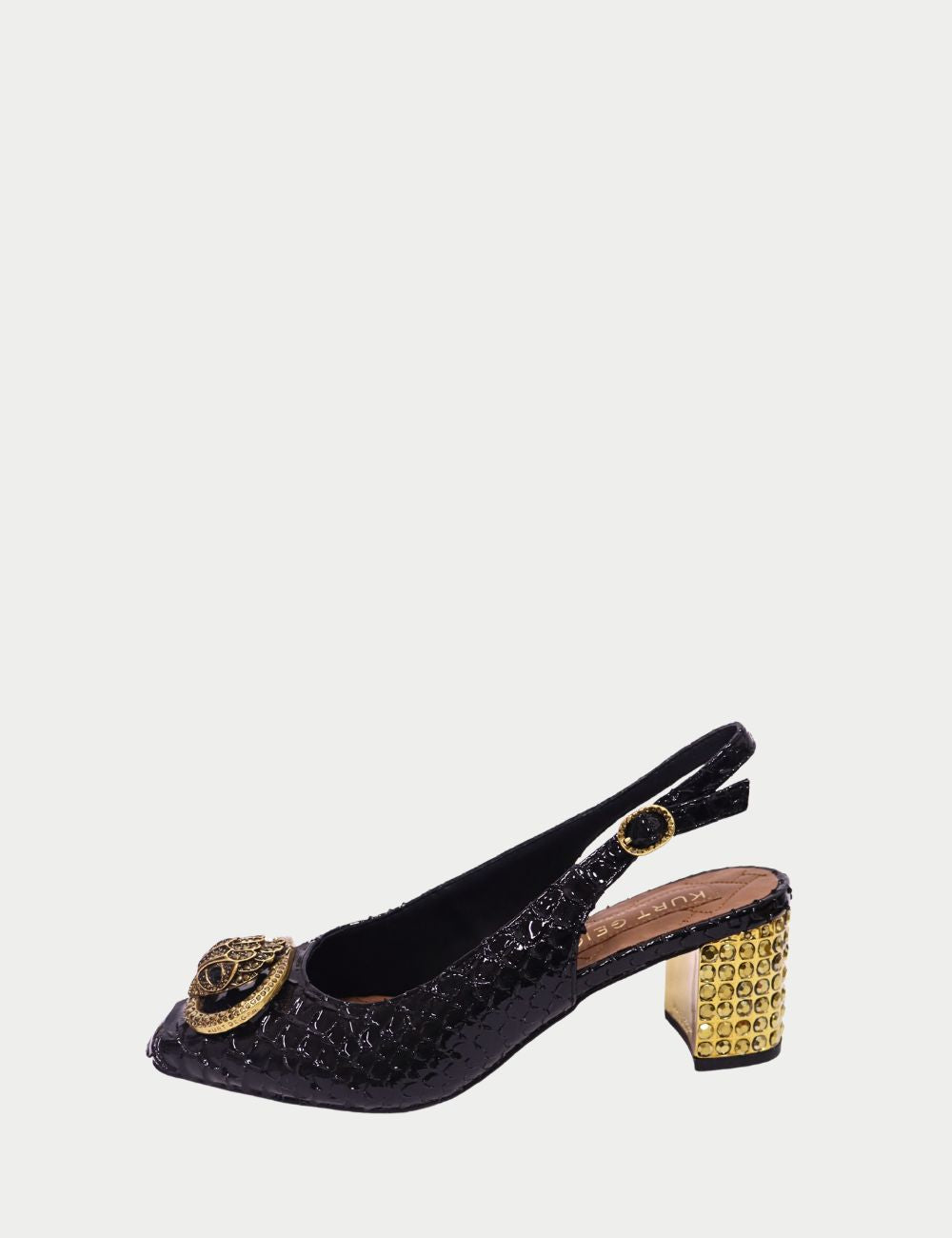 Make a statement with these Kurt Geiger slingback heels, crafted in glossy black croc-embossed leather and detailed with the brand’s signature gold eagle emblem at the toe. Featuring a square toe, adjustable slingback strap, and a block heel with gold stu
