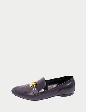 Louis Vuitton Black Leather Loafers – Classic slip-on flats with gold LV hardware