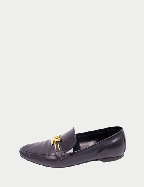 Louis Vuitton Black Leather Loafers – Classic slip-on flats with gold LV hardware