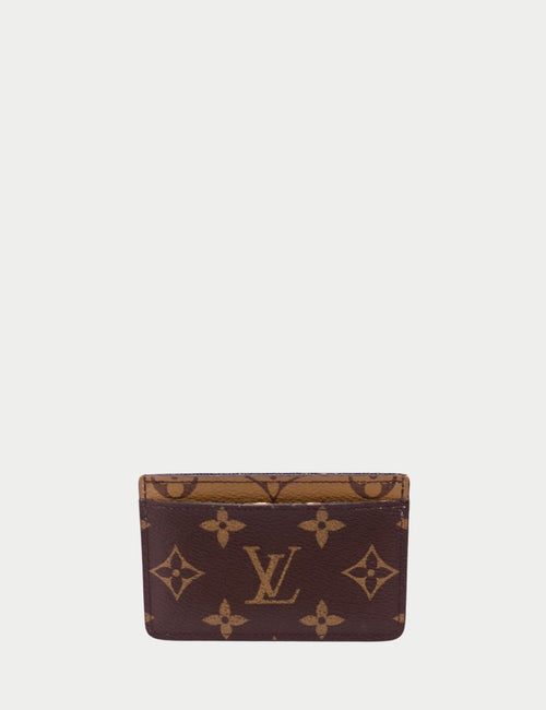 Louis Vuitton Monogram card holder in brown coated canvas with LV logo and floral motifs