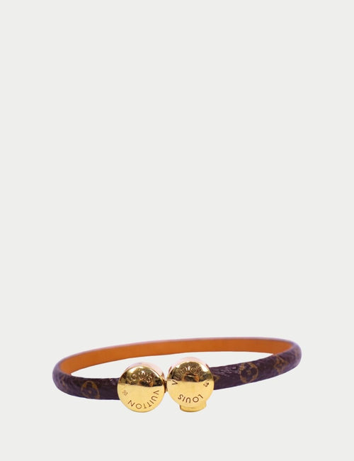 Louis Vuitton monogram leather bracelet with gold round clasp detail