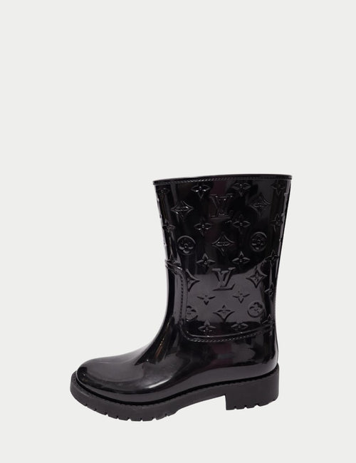 Louis Vuitton black mid-calf rain boots in glossy embossed rubber with LV monogram pattern