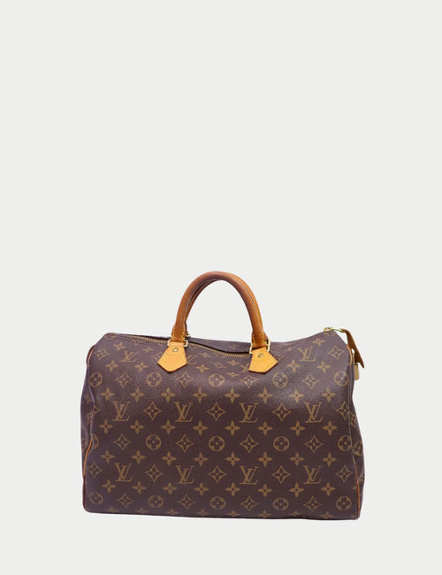 Louis Vuitton Speedy 35 Handbag in Monogram Canvas with Vachetta Leather Handles and Gold Hardware