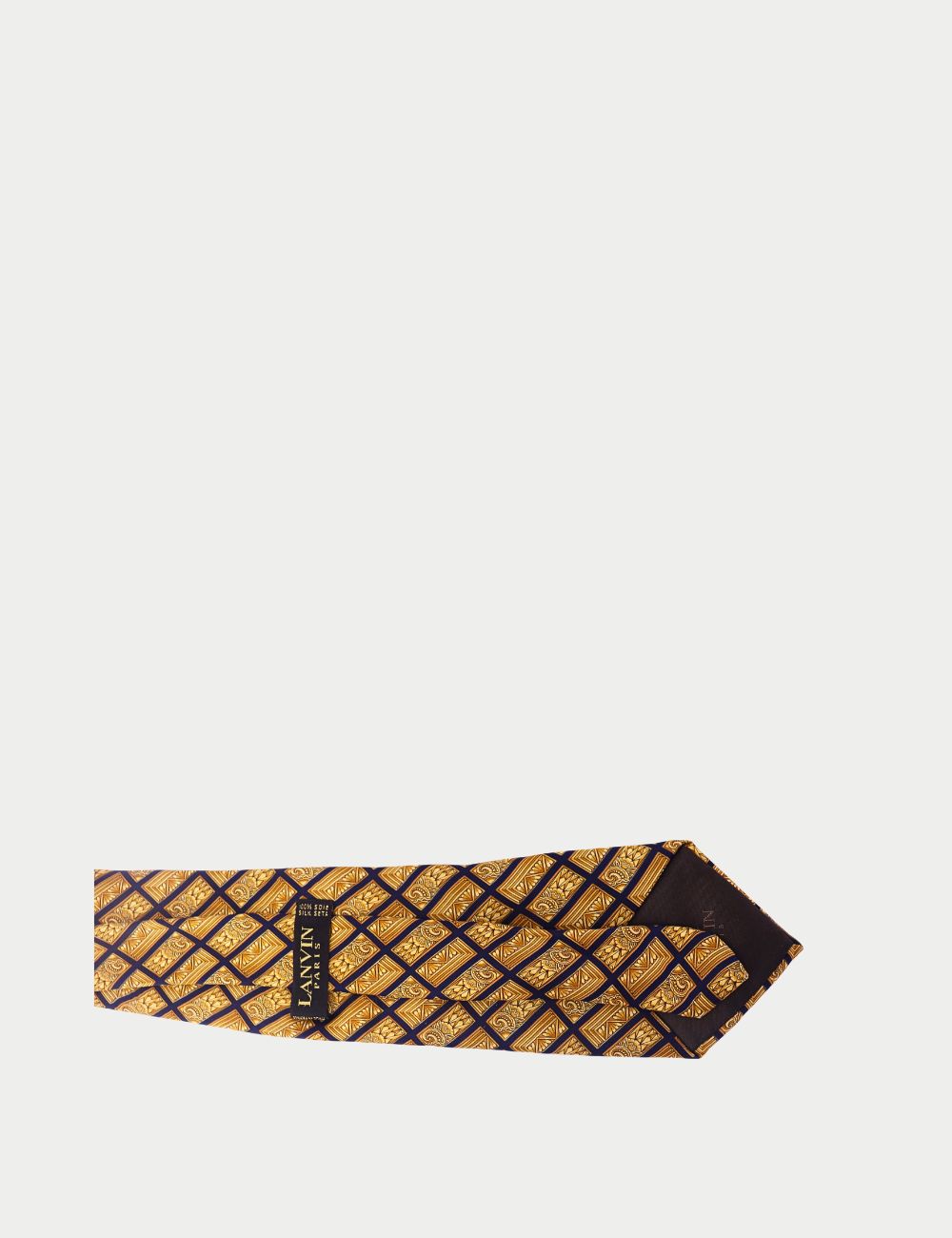 This Lanvin silk tie combines French sophistication with bold design. Crafted from luxurious silk, it features a striking gold geometric pattern on a navy base, making it a standout piece for both work and special occasions.
Details:
Material: 100% Sil This Lanvin silk tie combines French sophistication with bold design. Crafted from luxurious silk, it features a striking gold geometric pattern on a navy base, making it a standout piece for both work and special occasions.
Details:
Material: 100% Sil