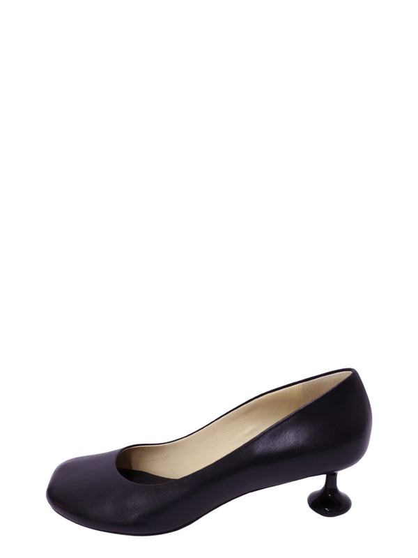 Authentic Loewe Toy black leather pumps with signature sculptural heel.