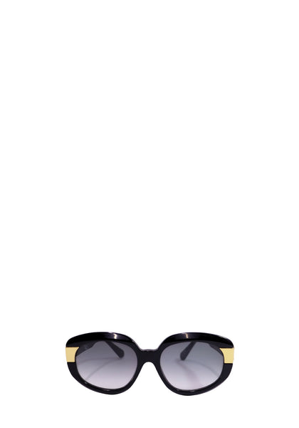 Authentic Louis Vuitton oversized black acetate oval sunglasses with gradient grey lenses and signature gold-tone temple hardware