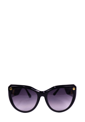 Louis Vuitton oversized black acetate sunglasses with gold LV logo detail on temples