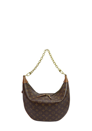 Louis Vuitton Loop shoulder bag in Monogram coated canvas with natural leather trim, gold-tone chain handle, and crescent-shaped silhouette.