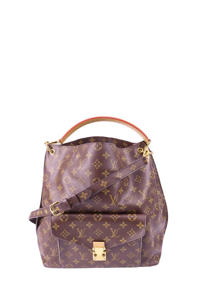 Louis Vuitton Métis Hobo shoulder bag in Monogram canvas with leather trim, adjustable strap, and gold-tone lock closure.