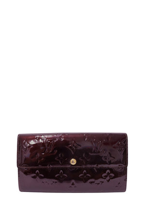 Louis Vuitton Sarah Wallet in Amarante Monogram Vernis patent leather featuring an embossed Monogram pattern, envelope flap, and gold-tone snap closure
