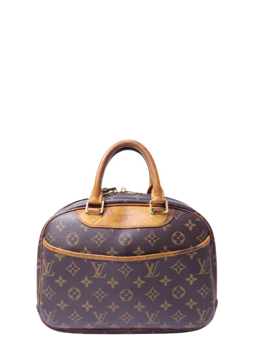 Louis Vuitton Trouville handbag in brown Monogram canvas featuring natural vachetta leather trim, dual top handles, gold-tone hardware, and a structured satchel silhouette