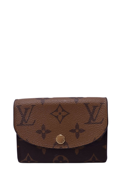Louis Vuitton Monogram Reverse compact wallet with gold-tone snap closure